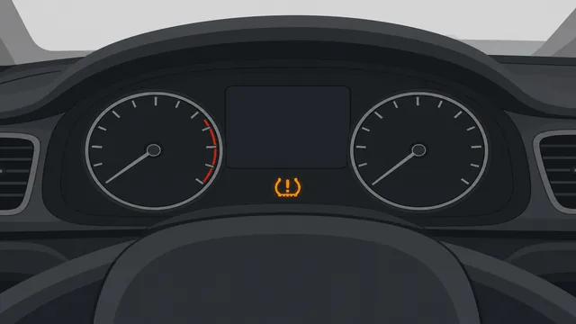 Gauge checking all four cold tires while a TPMS warning light is shown