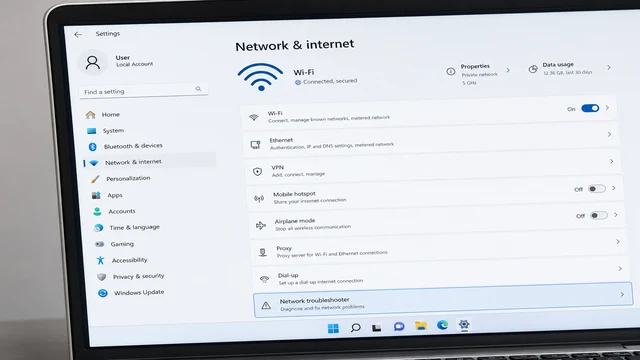 Windows laptop showing network troubleshooter settings screen