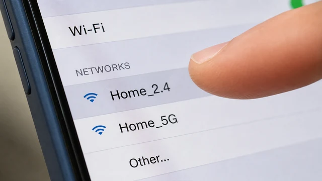 Phone Wi-Fi list showing separate 2.4 GHz and 5 GHz network names
