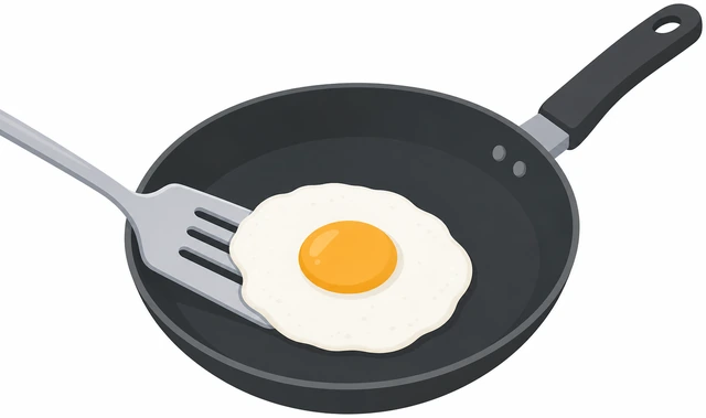 Illustration: a thin spatula sliding gently under a fried egg in a nonstick skillet