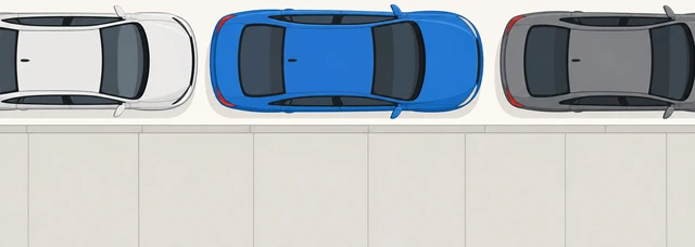 Illustration: car centered in parallel spot about one foot from curb