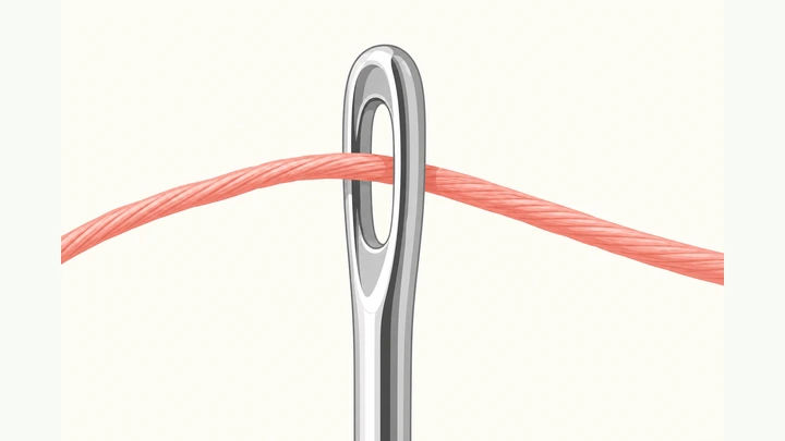 Illustration: close-up of thread passing through a sewing needle eye in bright light